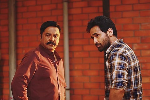 Sarathkumar and Amithash in 'Paramporul'.