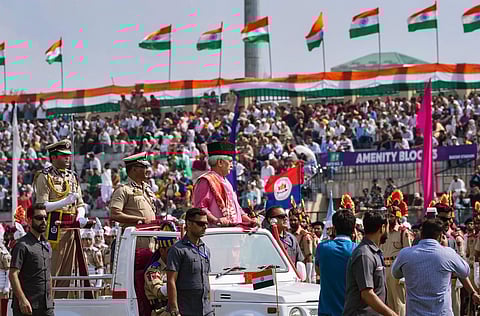 Jammu and Kashmir Lt Governor Manoj Sinha inspects a Guard of Honour during the 77th Independence Day celebrations at Bakshi Stadium, in Srinagar, Tuesday, Aug. 15, 2023. (PTI)