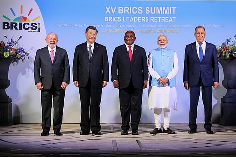 (L to R) Brazil President Lula, China's President Xi Jinping, South African President Cyril Ramaphosa, PM Narendra Modi and Russia's Foreign Minister Sergei Lavrov at the BRICS summit. (Photo | AFP)