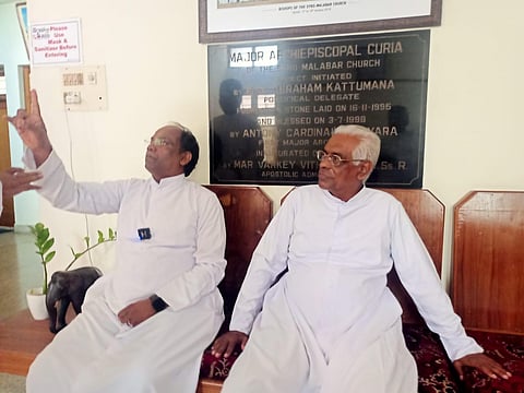 Fr Kuriakose Mundadan and Fr Sebastian Thalian staging a hunger strike in  the parlour of Mount St Thomas in Kakkanad on Tuesday. (Photo | Express)