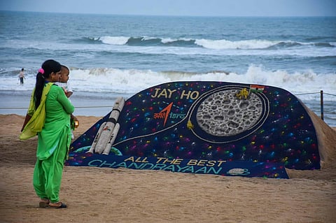 Students of Sudarshan Sand Art Institute at Puri in Odisha created a sand art depicting moon mission Chandrayaan-3, at Puri sea beach in Odisha. (Debadatta Mallick, EPS)