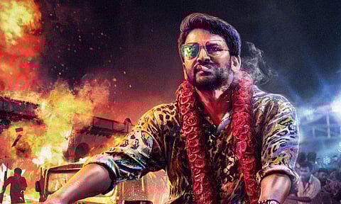 A poster from the film Uttarakaanda featuring Kannada star Dhananjay