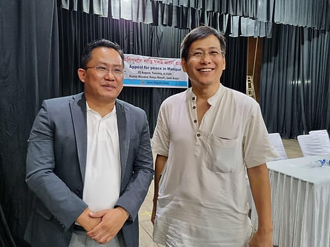 The two academicians standing together for peace.