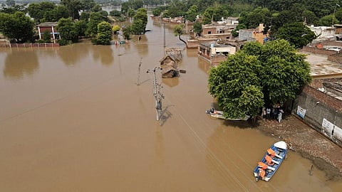 An aerial view of the flooded Chanda Singh Wala village in Kasur district on August 22, 2023. (Photo | AFP)