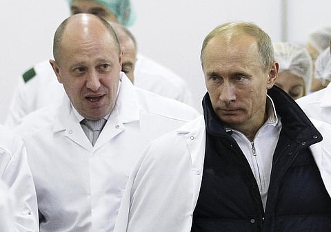 FILE - Yevgeny Prigozhin (L), shows Russian President Vladimir Putin, around his factory which produces school meals, outside St. Petersburg, Russia on Sept. 20, 2010. (Photo | AP)