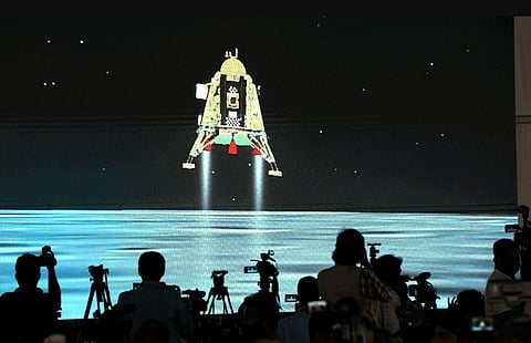 ISRO employees watch the successful soft landing of Chandrayaan-3 on the surface of the moon at ISRO's facility, in Bengaluru, Wednesday, Aug 23, 2023. (Photo | PTI)