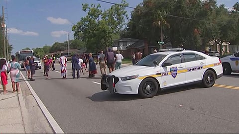 This video grab shows police cars on the site of a shooting in Jacksonville, Florida, August 26, 2023. A white man driven by racial hatred shot dead three Black people. (Photo | AFP)