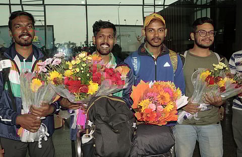 Nilachal Parida and his team being greeted at Bhubaneswar airport  |  Shamim Qureshy