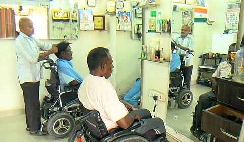 Raja provides free haircuts to disabled individuals at his salon in Vellore | EXPRESS