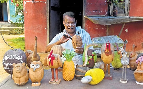 Rajan banks on Onam to give wings to his wooden parrots