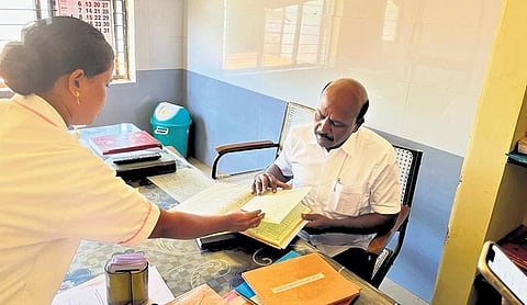 Minister Ma Subramanian inspects records at Thisayanvilai UPHC on Sunday| Express
