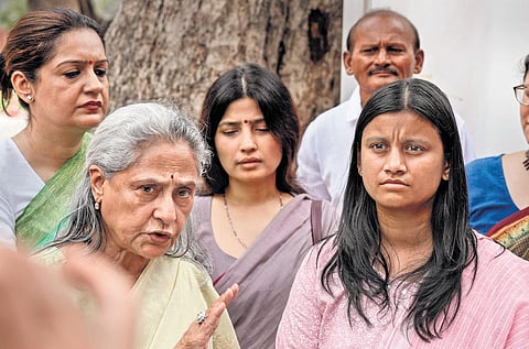 Dhara Shah, mother of baby Ariha, in the presence of SP MPs Jaya Bachchan and Dimple Yadav, and Shiv Sena (UBT) MP Priyanka Chaturvedi. (Photo | PTI)