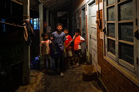 FILE - In this picture taken on July 25, 2023, children look on at a relief camp for displaced tribals in Churachandpur. (Photo | AFP)