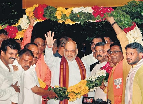 Union Home Minister Amit Shah being welcomed by state BJP leaders at Biju Patnaik International Airport in Bhubaneswar on Friday | Shamim Qureshy