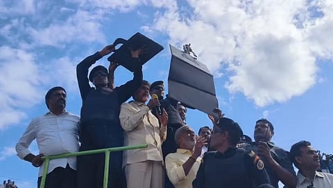 NSG commandos shield Chandrababu Naidu while he was speaking in Anagallu. (Photo | Express)