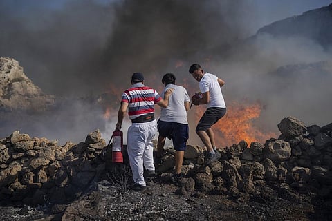 Heat and wildfires put southern Europe's vital tourism earnings at risk
