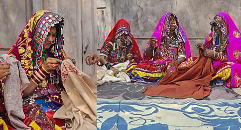 Women of the nomadic Lambani community in Karnataka's Vijayapura busy at embroidery and mirrorwork. (PTI)