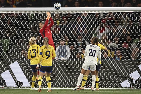 Sweden's goalkeeper Zecira Musovic, top, saves a ball during the Women's World Cup round of 16 soccer match against United States, Aug 6, 2023. (Photo | AP)