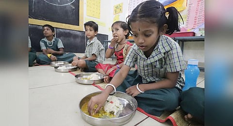 The Chief Minister's breakfast scheme for government primary school children is being implemented at a cost of 404 crore rupees. (Photo | K K Sundar)