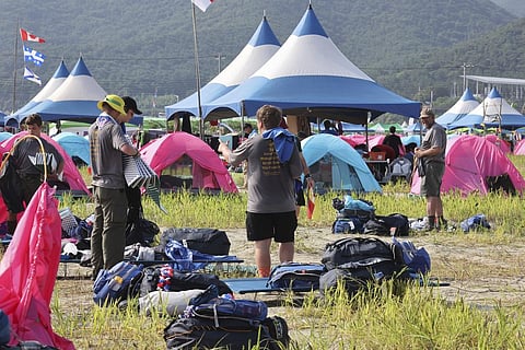U.S. scout members prepare to leave the World Scout Jamboree campsite in Buan, South Korea, Sunday, Aug. 6, 2023. (Photo | AP)