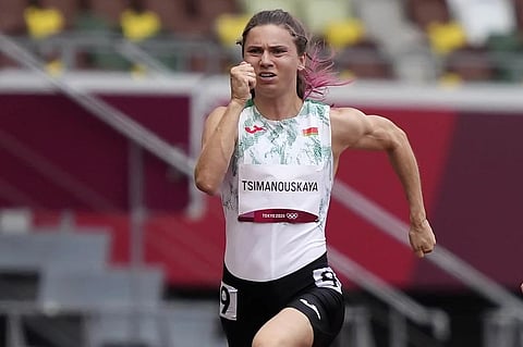 Krystsina Tsimanouskaya, of Belarus, runs in the women’s 100-meter run at the 2020 Summer Olympics, Japan, on July 30, 2021. (Photo | AP)