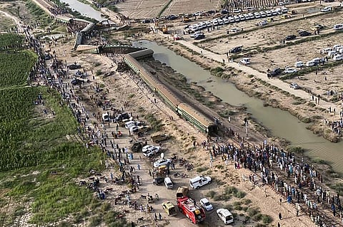 Arial view of the site of a passenger train derailed near Nawabshah, Pakistan. (Photo | PTI)
