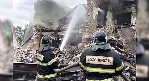 Emergency services working at the site of an explosion that occured on the grounds of the Zagorsk Optical-Mechanical Plant in the city of Sergiyev Posad. (Photo | PTI)