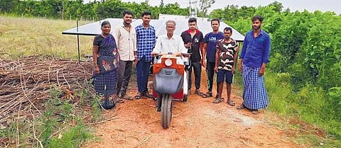Channabasappa and residents of Siddavvanadurga with the solar powered tractor