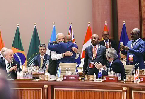 Prime Minister Modi hugs President of the Union of the Comoros and Chairperson of the African Union Azali Assoumani at the Bharat Mandapam, in New Delhi, on Sept. 9, 2023. (PTI)