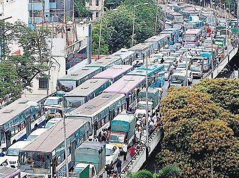 Traffic jam on Anand Rao Circle flyover as private vehicle drivers took out a rally demanding that the government fulfill their demands.