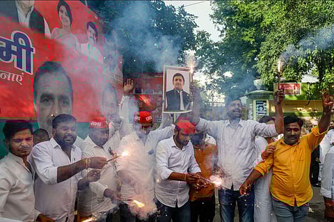 FILE - Samajwadi Party workers celebrate the victory of party candidate Sudhakar Singh in the Ghosi constituency by-election, in Lucknow, Friday, Sept. 8, 2023. (Photo | PTI)