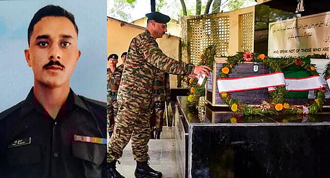 An Army officer pays tribute to Rifleman Ravi who was killed during an encounter with terrorists in the Rajouri district. (PTI)