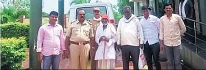 Eighty-year-old Ganapati Vithal Waghmore (centre) after his arrest | EXPRESS
