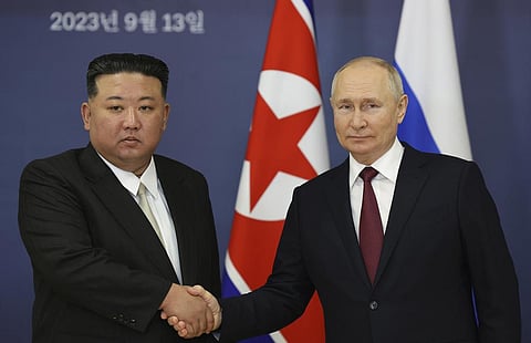 Russian President Vladimir Putin (R) with North Korea's leader Kim Jong Un during their meeting at the Vostochny cosmodrome in Russia's far eastern Amur region, Sept. 13, 2023. (Photo | AP)