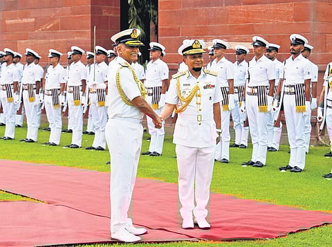 Chief of Naval Staff Admiral R Hari Kumar greets Bangladesh’s Navy chief Admiral Mohammad Nazmul Hassan (R) in New Delhi on Wednesday. (Photo | PTI)