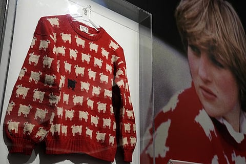 The historic Princess Diana black sheep jumper on display at the auction house Sotheby's (Photo | AP)
