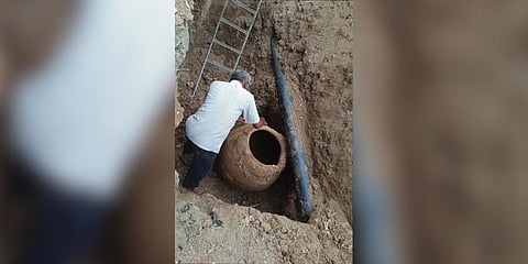 Ancient burial urn dating back to more than 2000 years, was found during the digging for pipeline laying work in the heart of Tiruppur city.