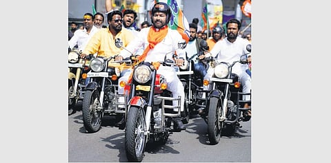 BJP State president G Kishan Reddy leads a bike rally from the Parade Ground in Secunderabad to Parkal Amaradhamam in Hanamkonda district on Friday