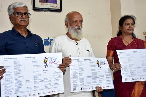 Indian Theatre Foundation founder, theatre director Prasanna, Rangayana deputy director Nirmala Matapathi released the poster of Childrens Theatre festival in Mysuru on Saturday. (Udayashankar S, EPS)