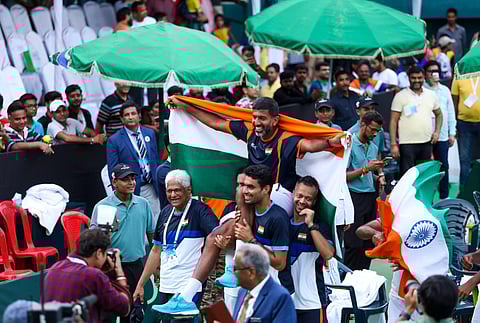 India's Rohan Bopanna being lifted by team members on their shoulders at the end of India's 3-1 win over Morocco in their World Group-II Davis Cup tie in Lucknow on Sunday. (Photo | PTI)