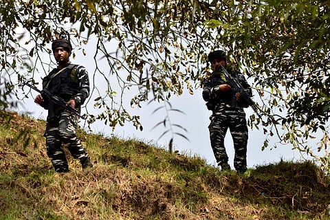 Security personnel on the fifth day of the ongoing encounter with terrorists, at Gadol Kokarnag in Anantnag district, on Sept. 17, 2023. (PTI)