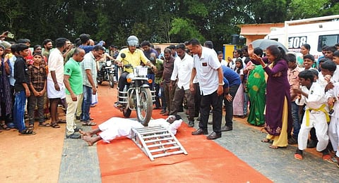 A martial artist from Cherangode near Pandalur attempted to win a Guinness World Record with a daredevil performance. (Photo | Express)