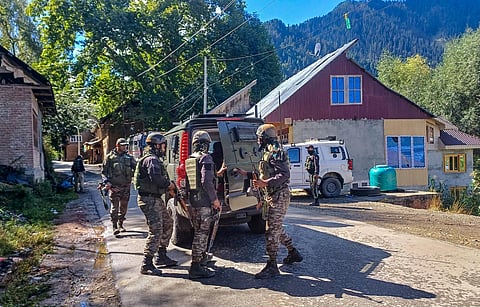 Security personnel during a search operation at Kokernag area, in Anantnag district on Tuesday. (Photo | PTI)