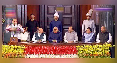 Congress MP Adhir Ranjan Chowdhury speaks at the event organised in the Central Hall of Parliament on the occasion of the shifting of Parliament to the new building. (Photo | PTI)