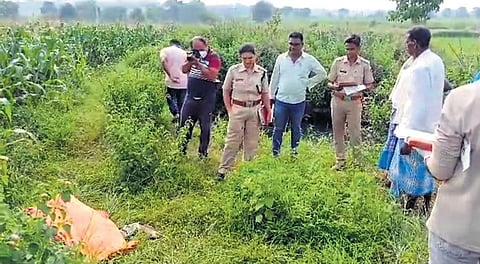 Police inspecting the spot near the well where the girl’s body was found | Express