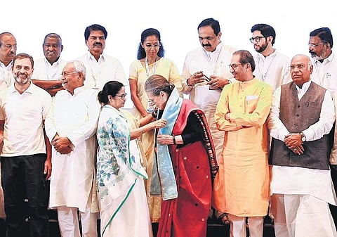 TMC chief Mamata Banerjee felicitates Congress leader Sonia Gandhi on the second day of INDIA meeting | pti