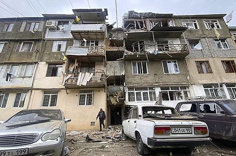 A damaged residential apartment building following shelling is seen in Stepanakert, Nagorno-Karabakh.  (Photo | AP)