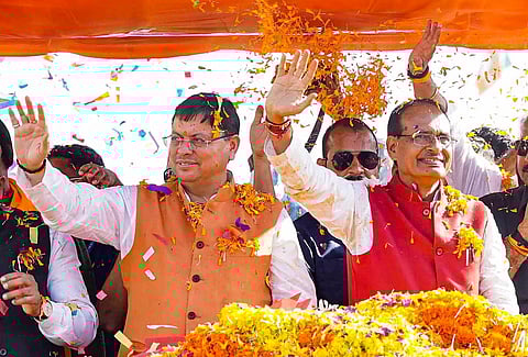 Madhya Pradesh CM Shivraj Singh Chouhan with Uttarakhand CM Pushkar Singh Dhami during BJP's 'Jan Ashirwad Yatra', at Khurai in Sagar district, Madhya Pradesh. (PTI)