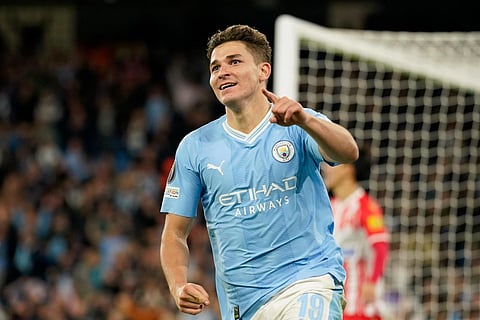 Manchester City's Julian Alvarez celebrates after scoring his side's first goal. (Photo | AP)