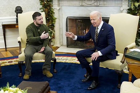 FILE - US President Joe Biden speaks with Ukrainian President Volodymyr Zelenskyy as they meet in the Oval Office of the White House, Dec. 21, 2022, in Washington. (Photo | AP)